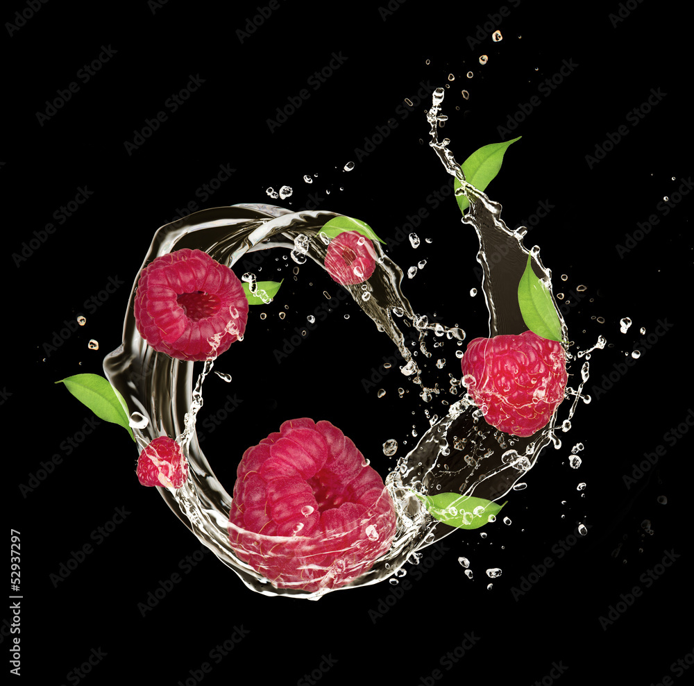 Fresh fruit in water splash, isolated on black background