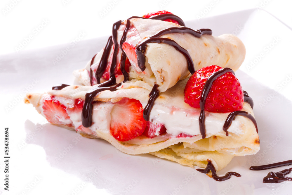 Delicious mascarpone cheese pancakes with fresh strawberries