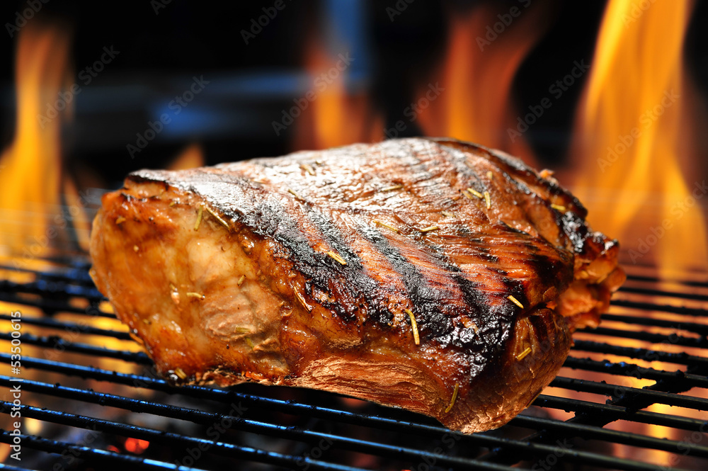 Grilled pork on the grill.