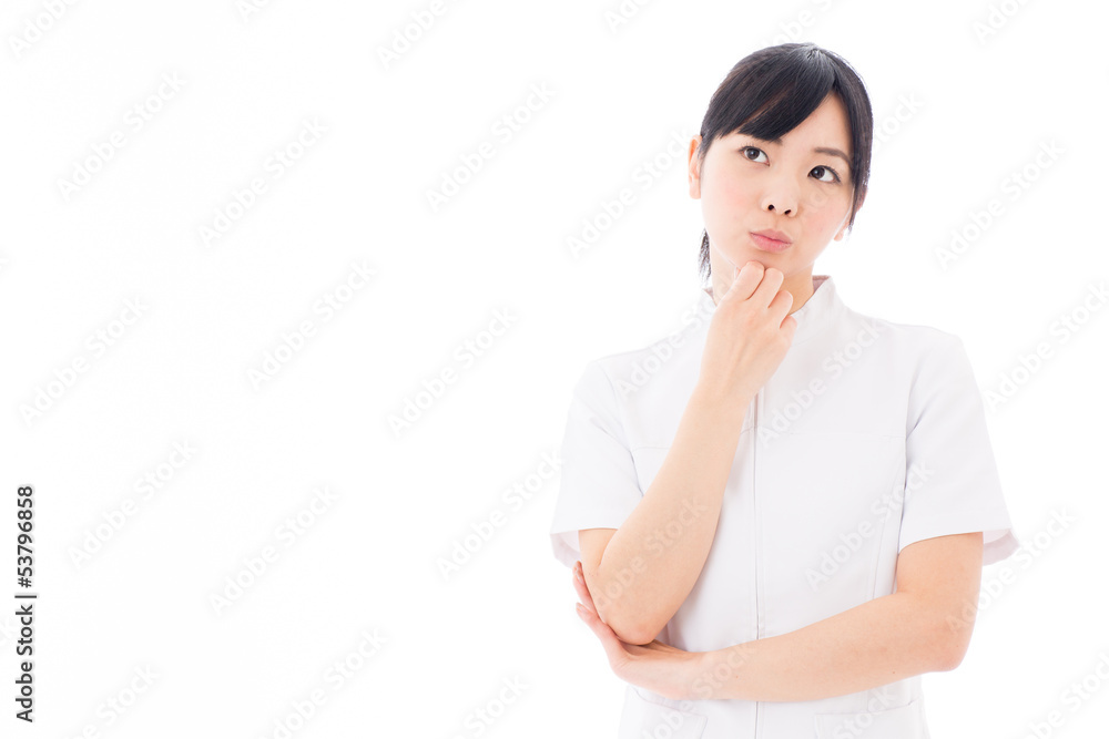 attractive asian nurse thinking on white background