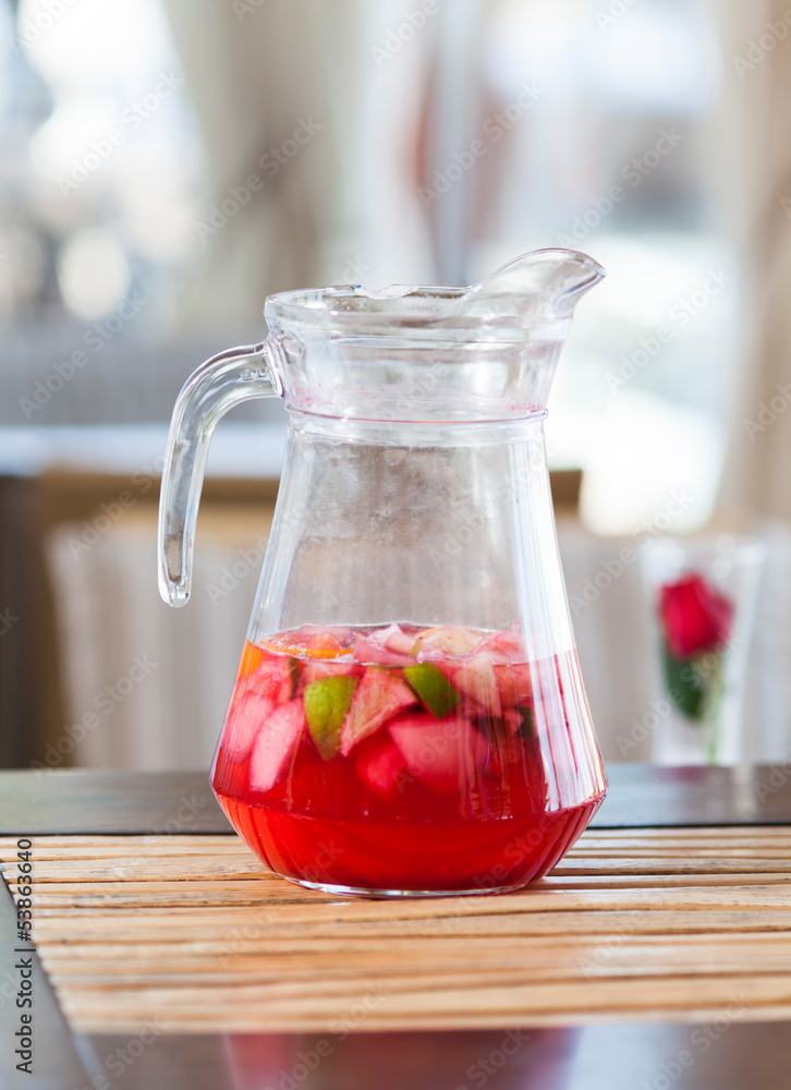 jug of fresh red fruit drink