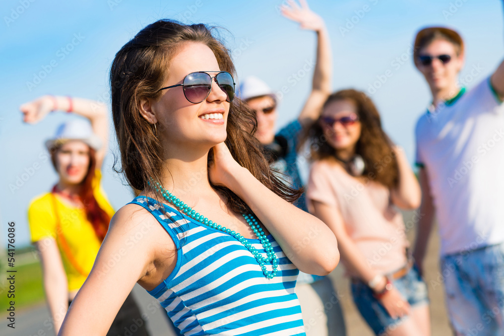 stylish young woman in sunglasses