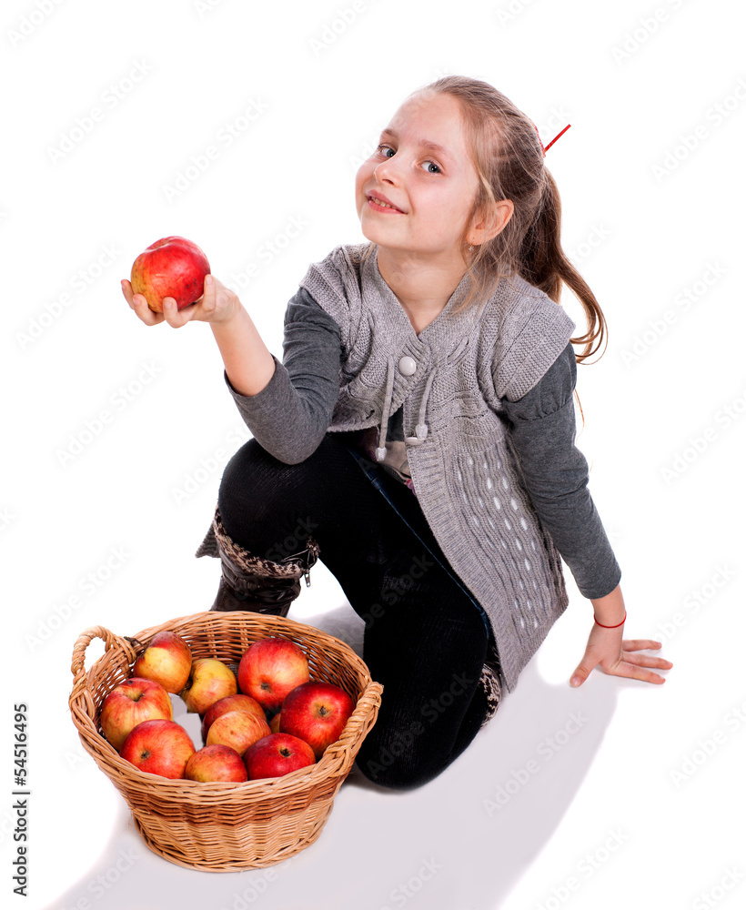 Pretty girl  with basket of red apples