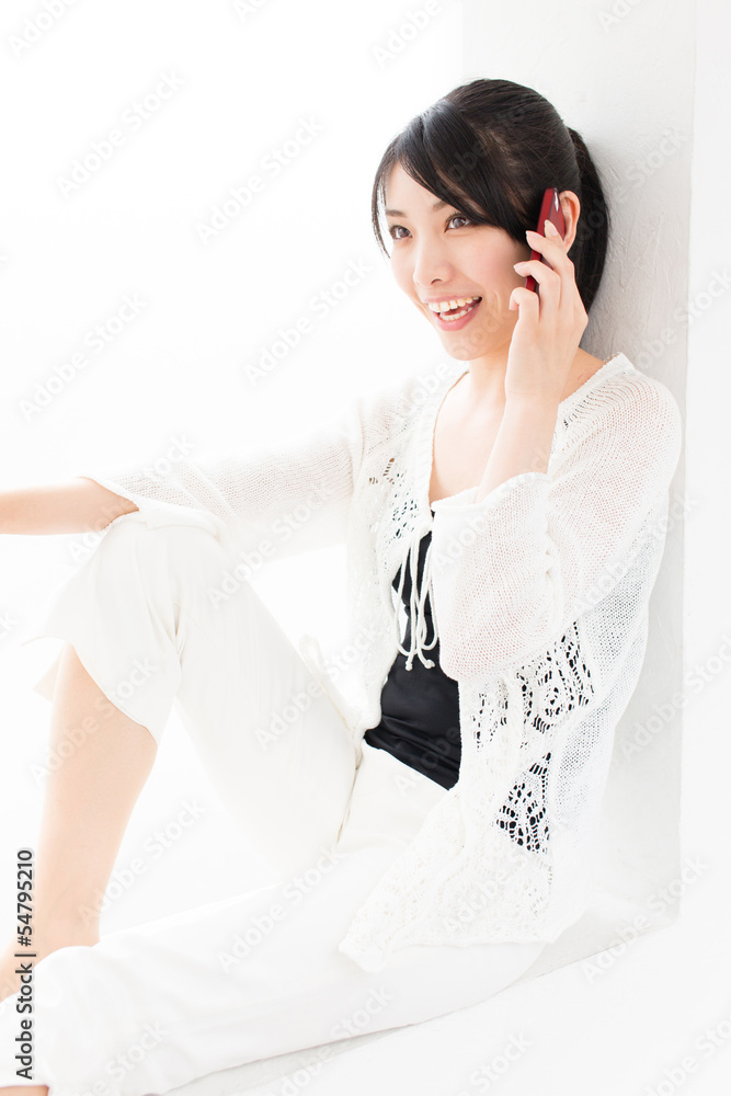 attractive asian woman using smart phone