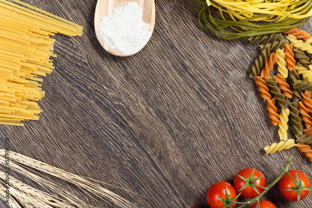 pasta, tomatoes and flour on the spoon