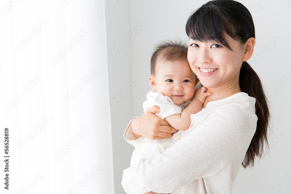 asian baby and mother relaxing