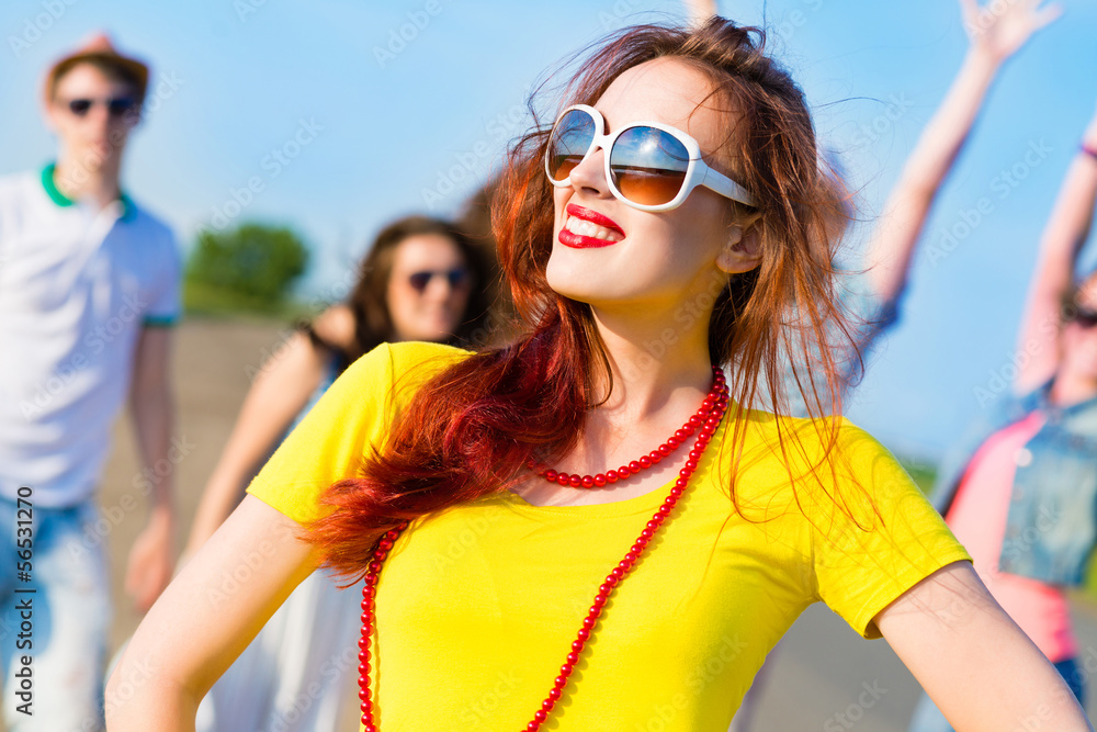 stylish young woman in sunglasses