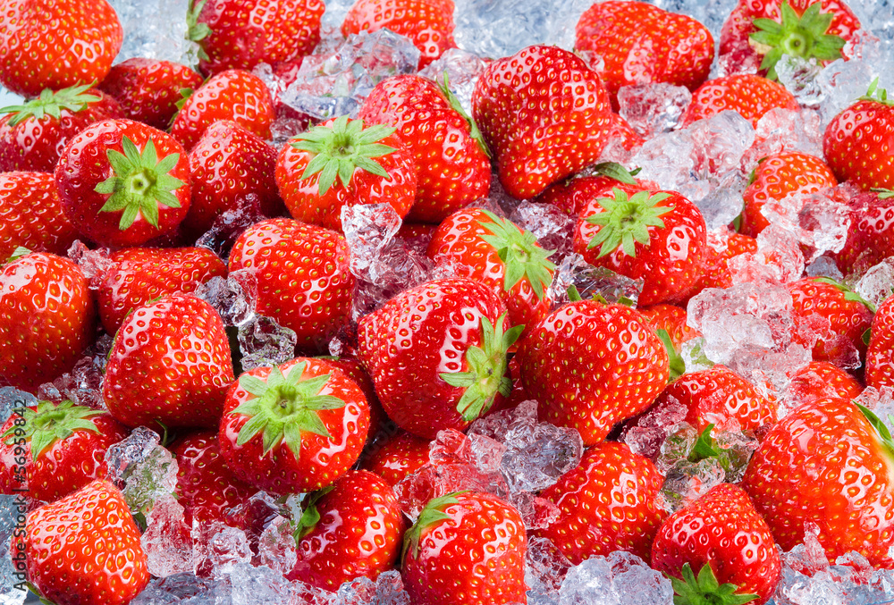 Fresh ripe strawberry with ice. Fruit Background