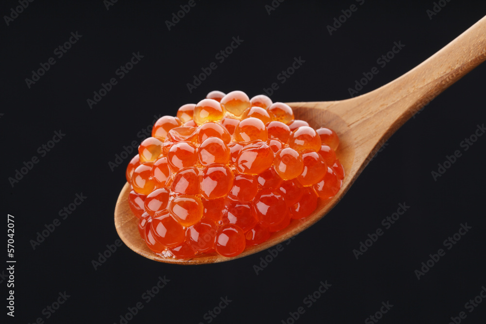 Red caviar on the spoon