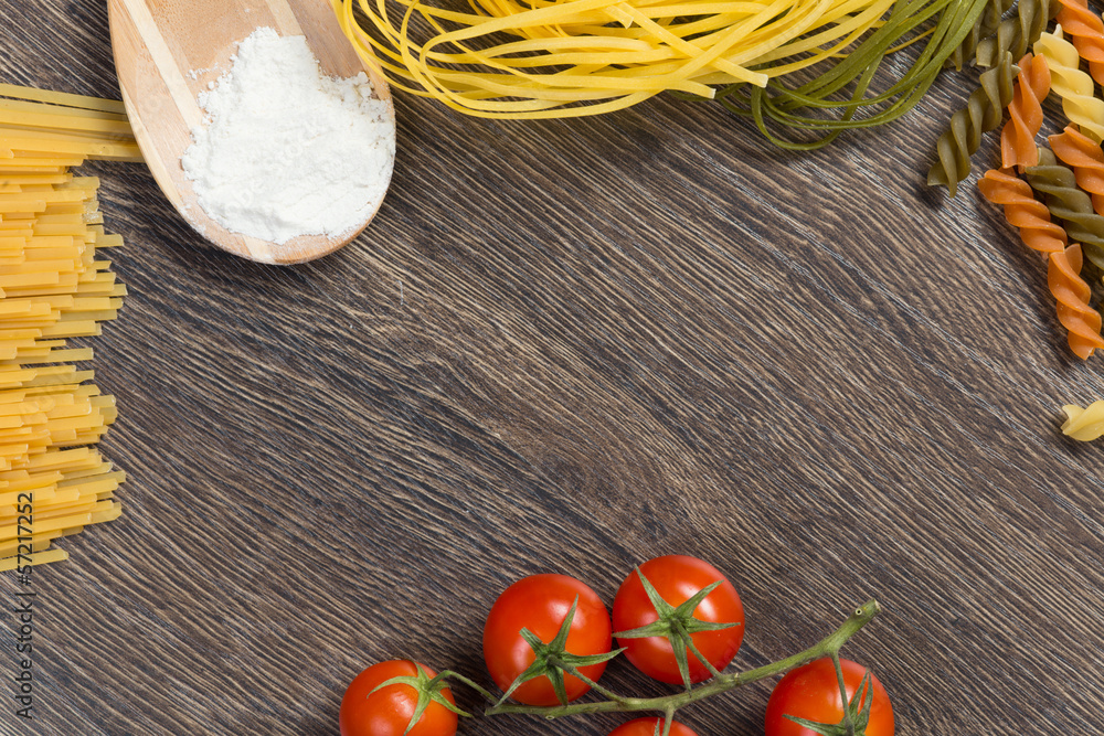 pasta, tomatoes and flour on the spoon