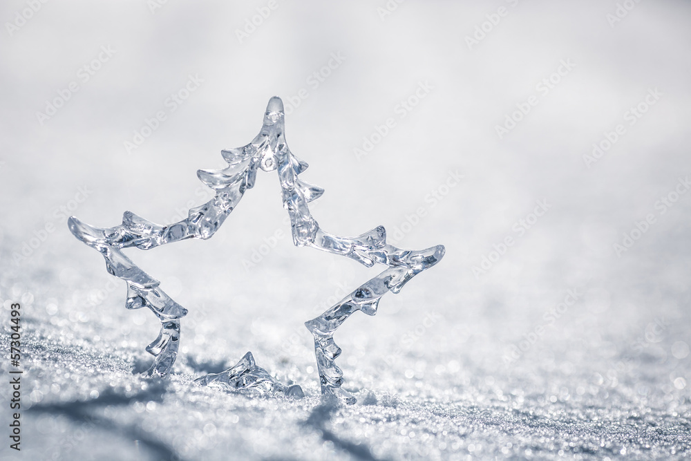 Silver Christmas star on snow