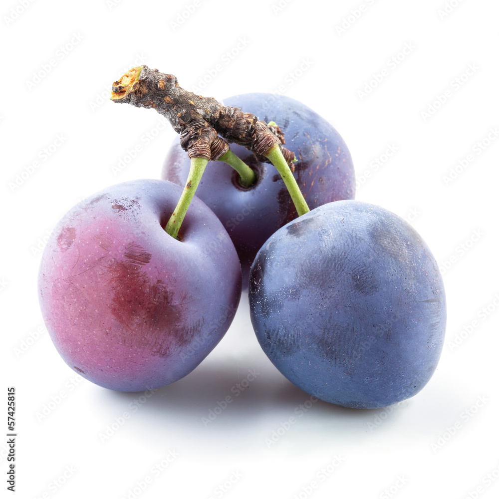 Plums isolated on white