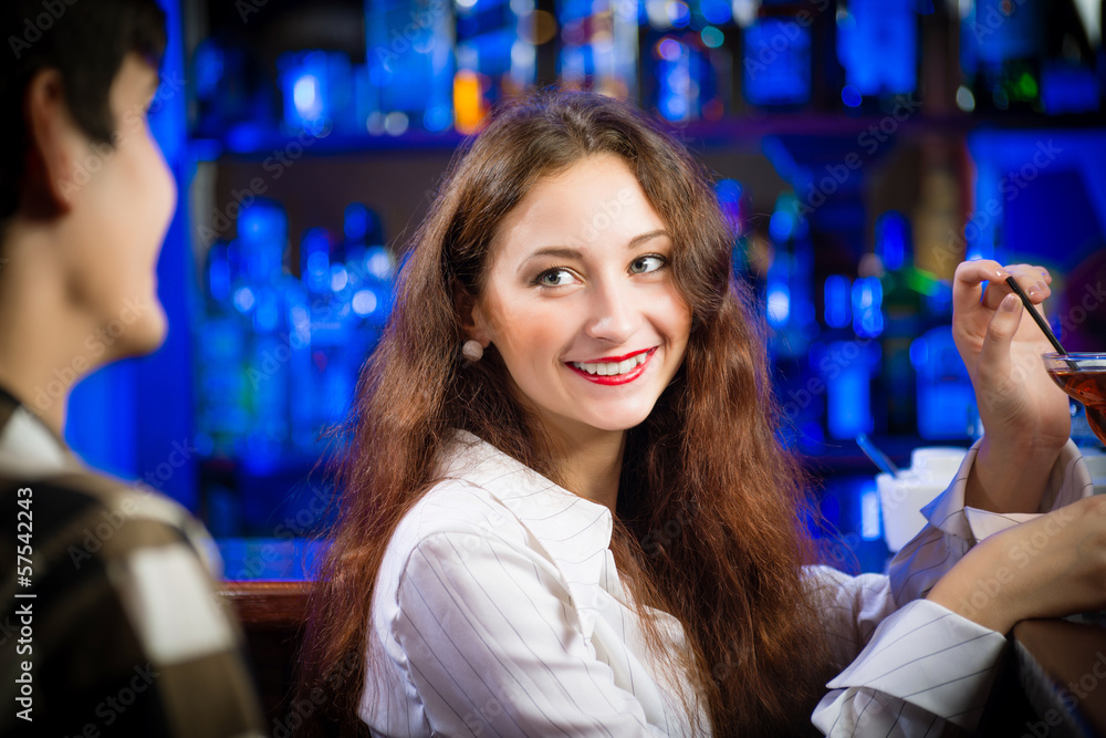 young woman in a bar