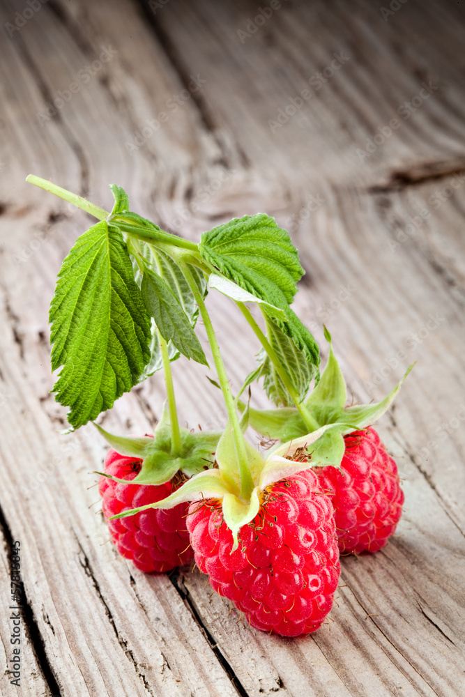 raspberry on wood background