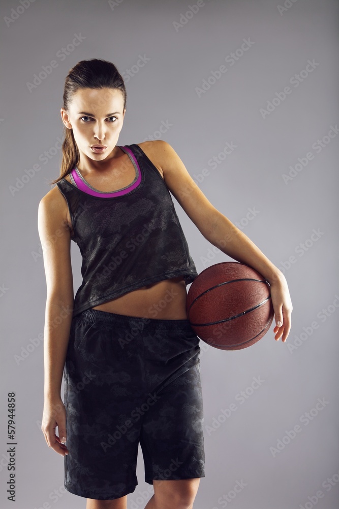 Beautiful young female basketball player