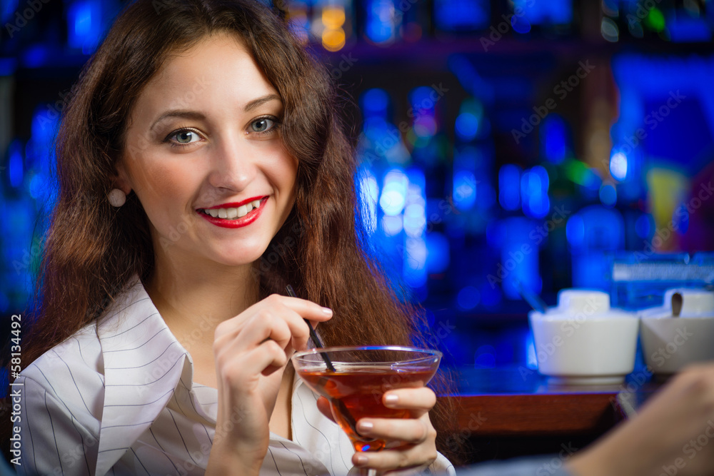 young woman in a bar