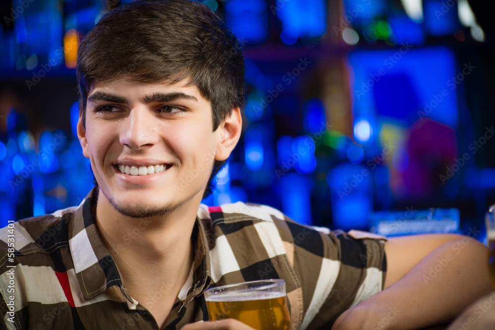 portrait of a young man at the bar