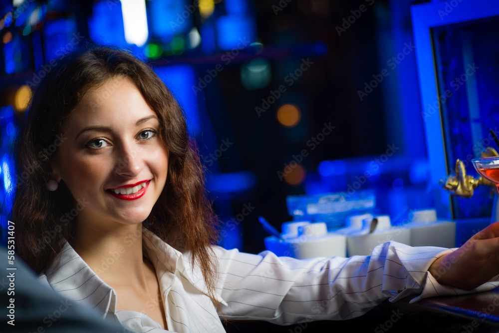 young woman in a bar