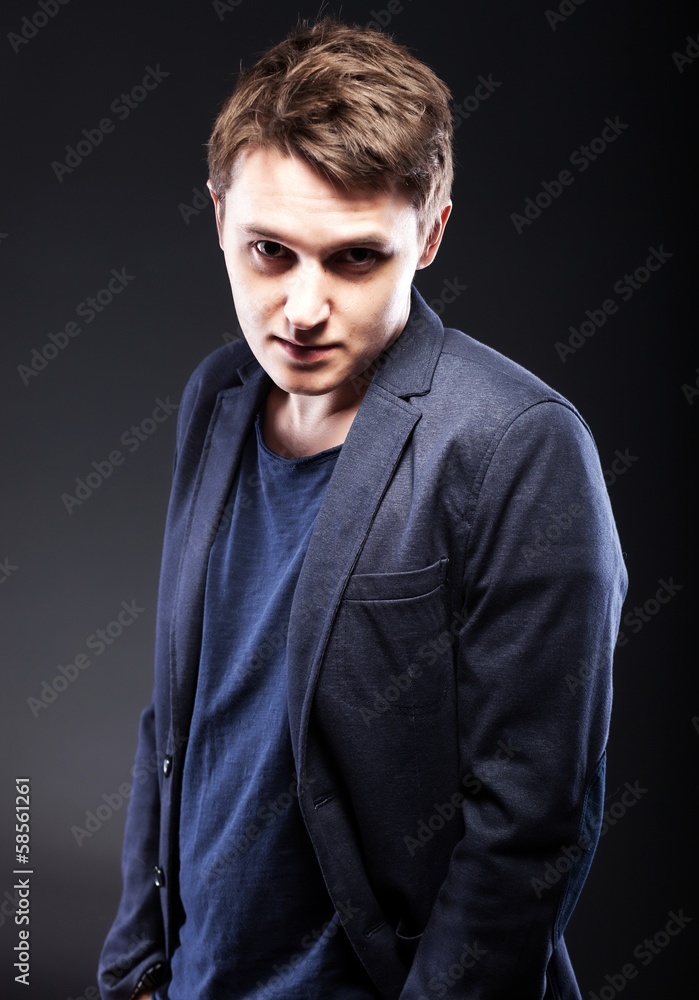 Portrait of casual young man in jacket and tshirt