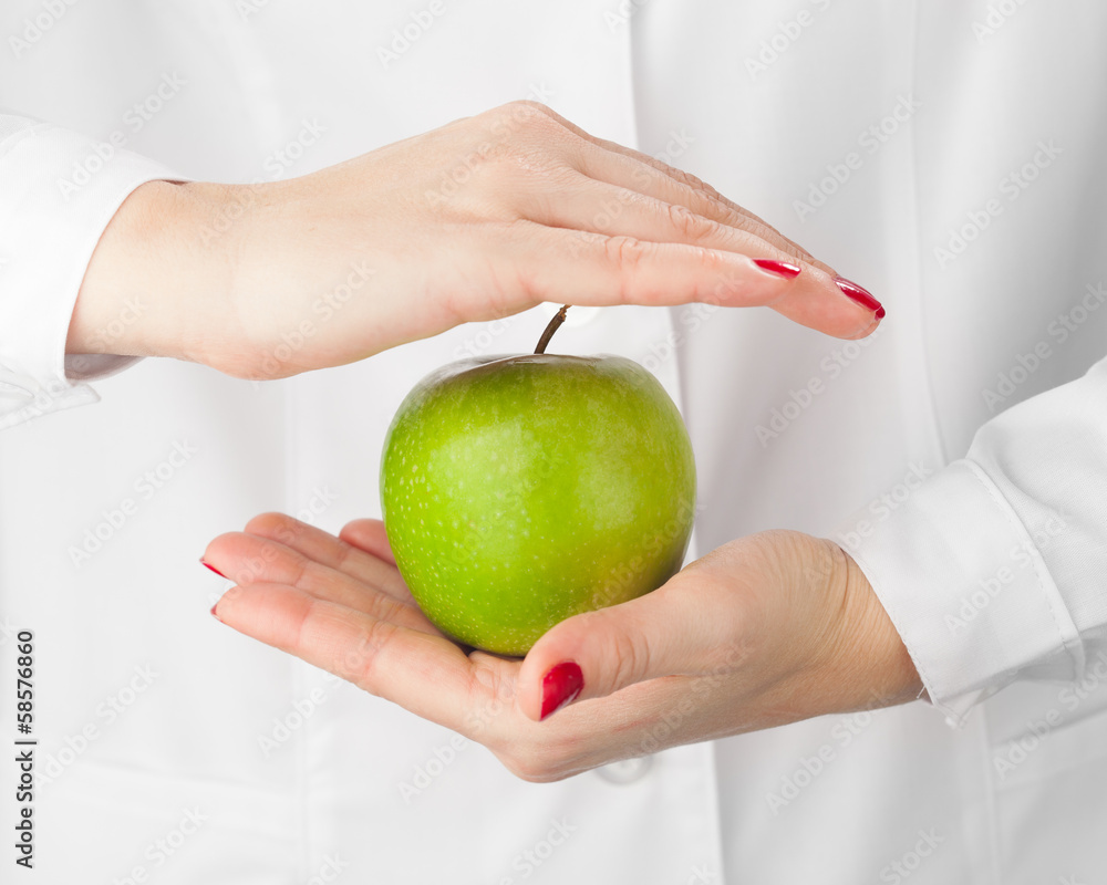 green apple in hand