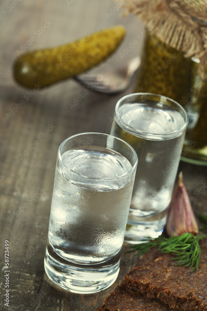 Russian vodka with traditional black bread and pickles