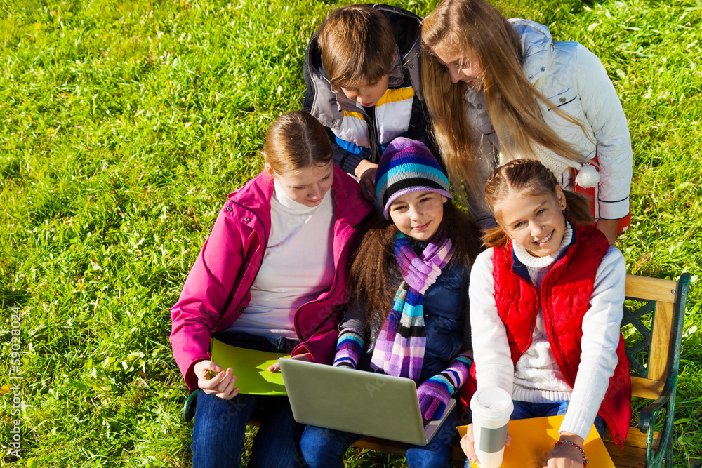 Group of teen kids with laptop