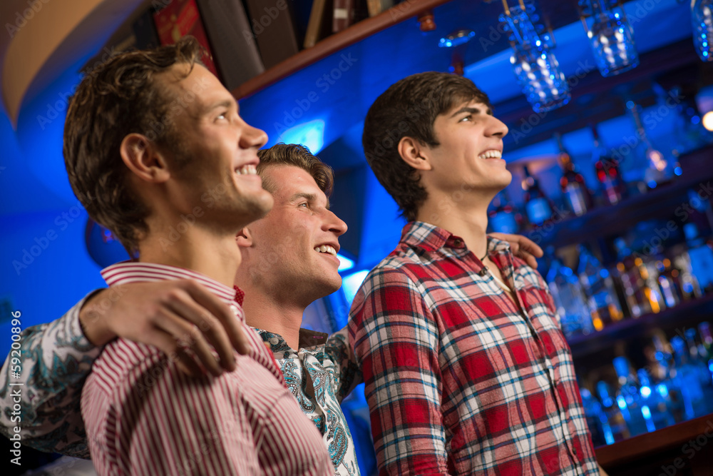 portrait of the fans in the bar