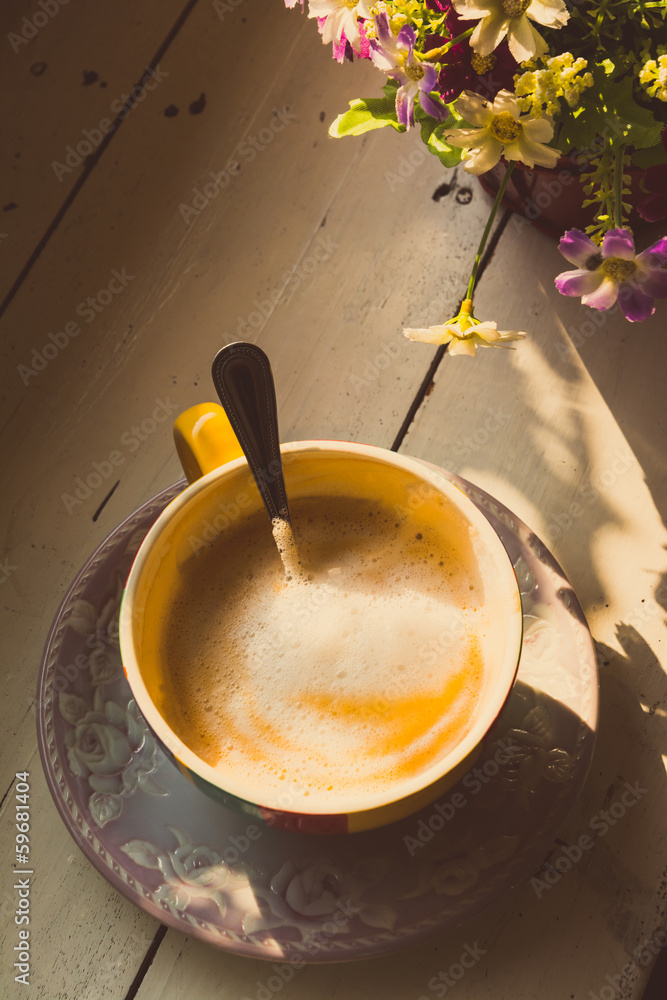 Cup of tea with flowers