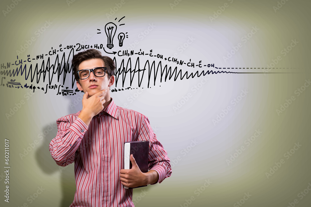 young man scientist with glasses thinking