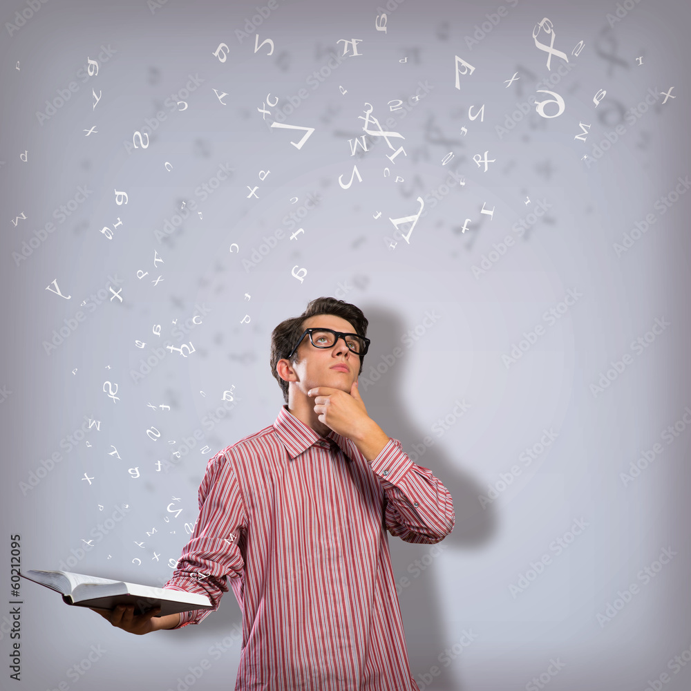 young scientist holding a book