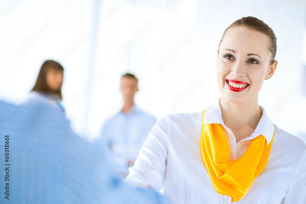 business woman shaking hands with a client