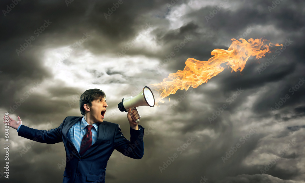 businessman shouting into a megaphone