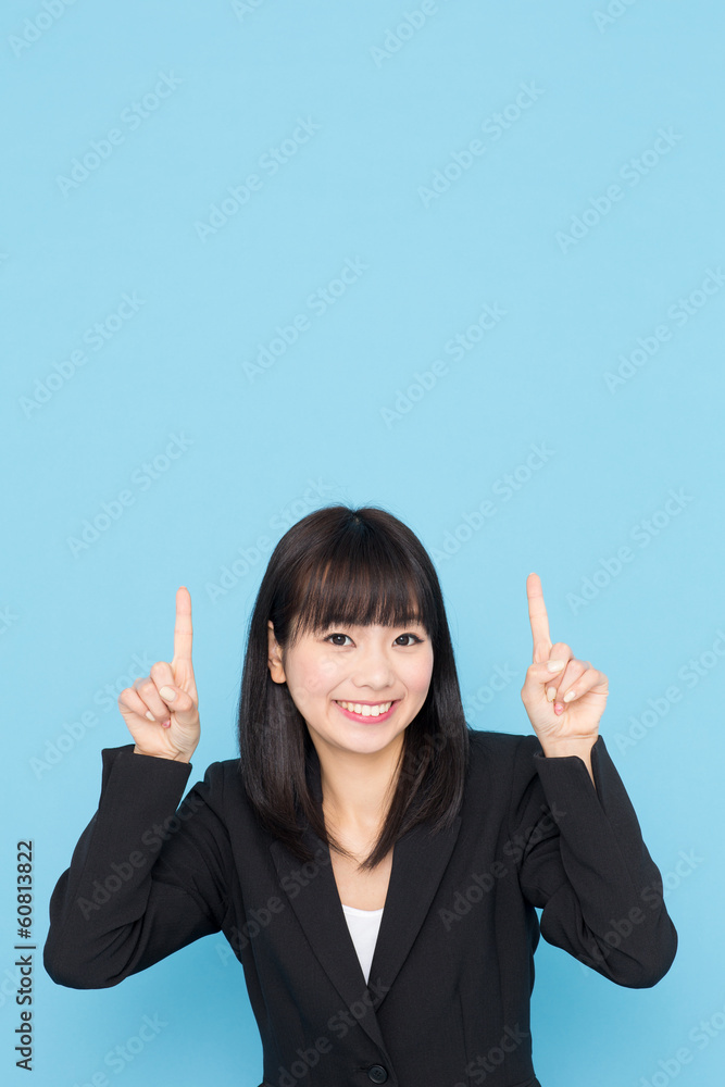 asian businesswoman on blue background