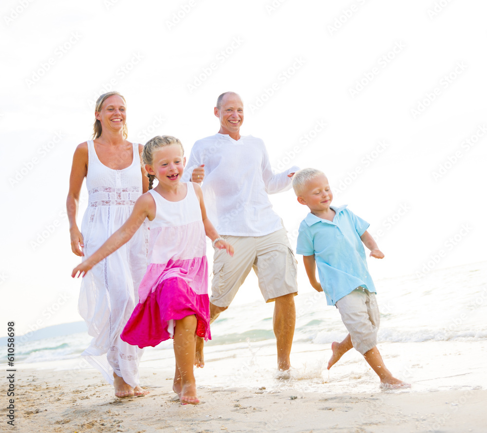 Family Running at The Beach