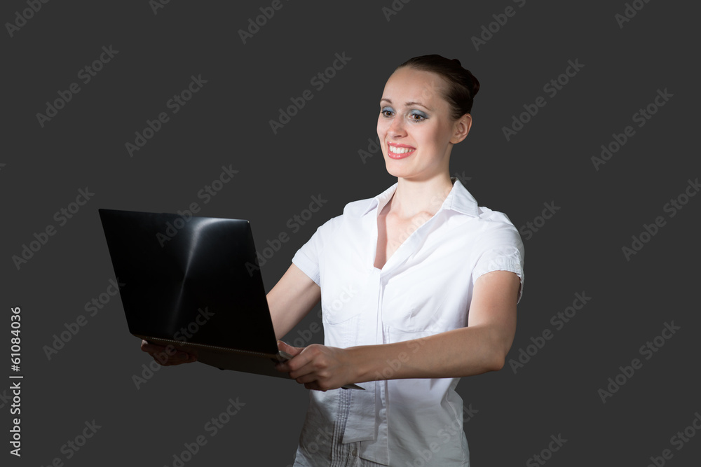 business woman holding a laptop