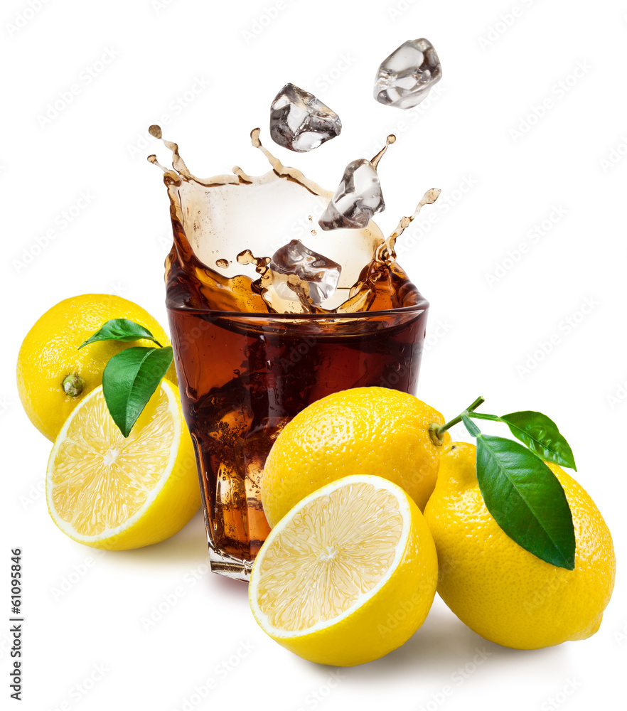 Glass of cola with ice and lemon isolated on white.