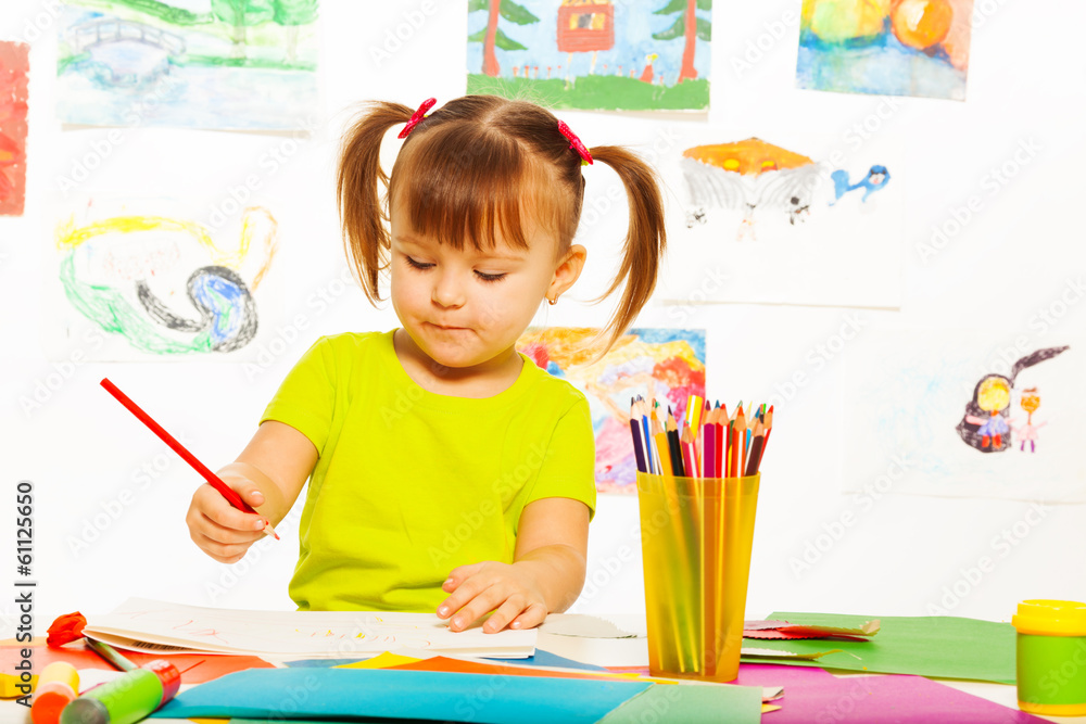 Cute girl draw with pencil