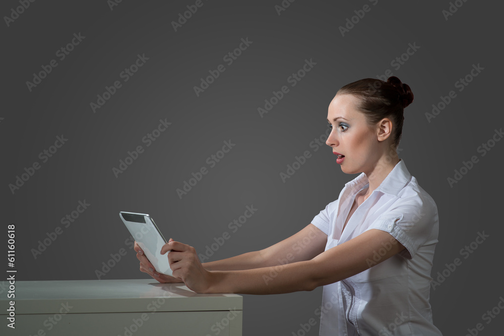 business woman holding a tablet computer