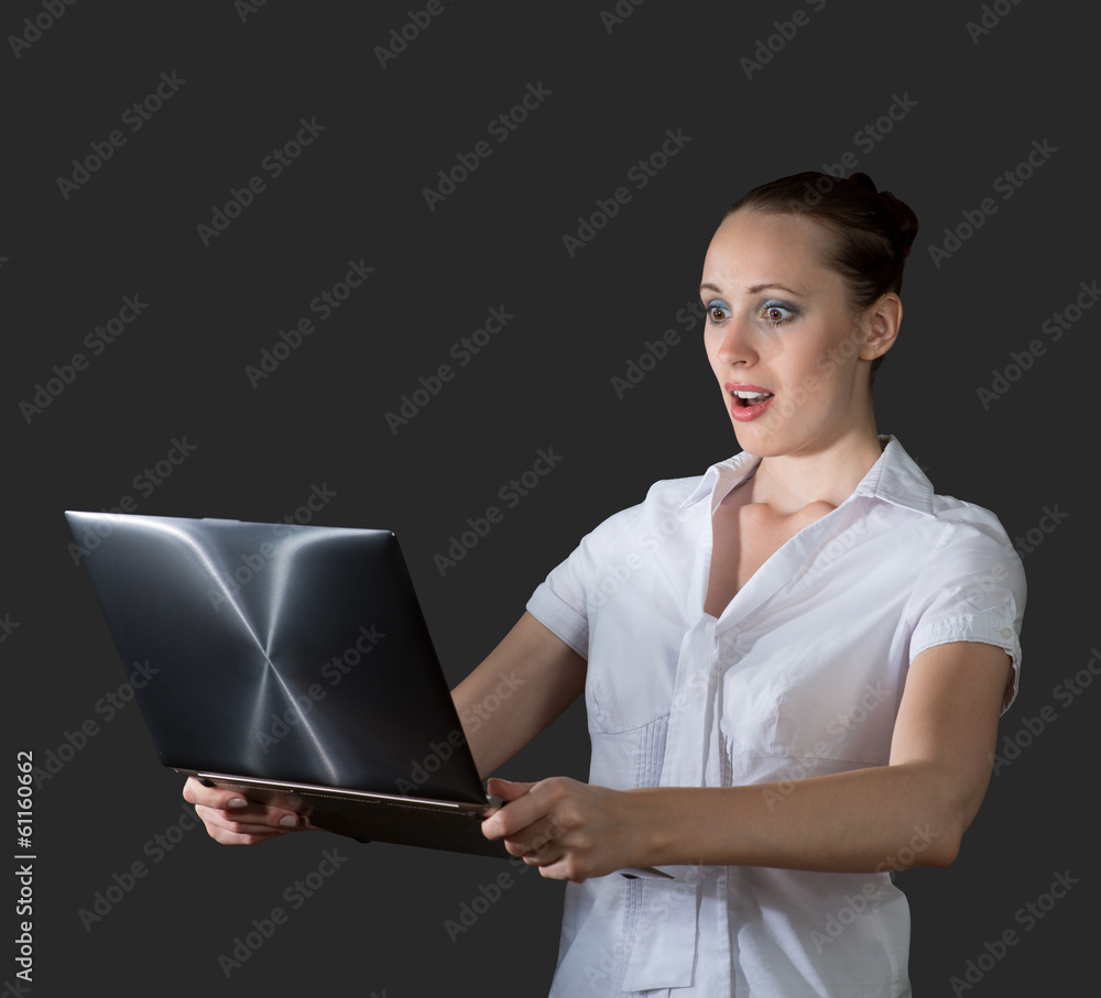 business woman holding a laptop