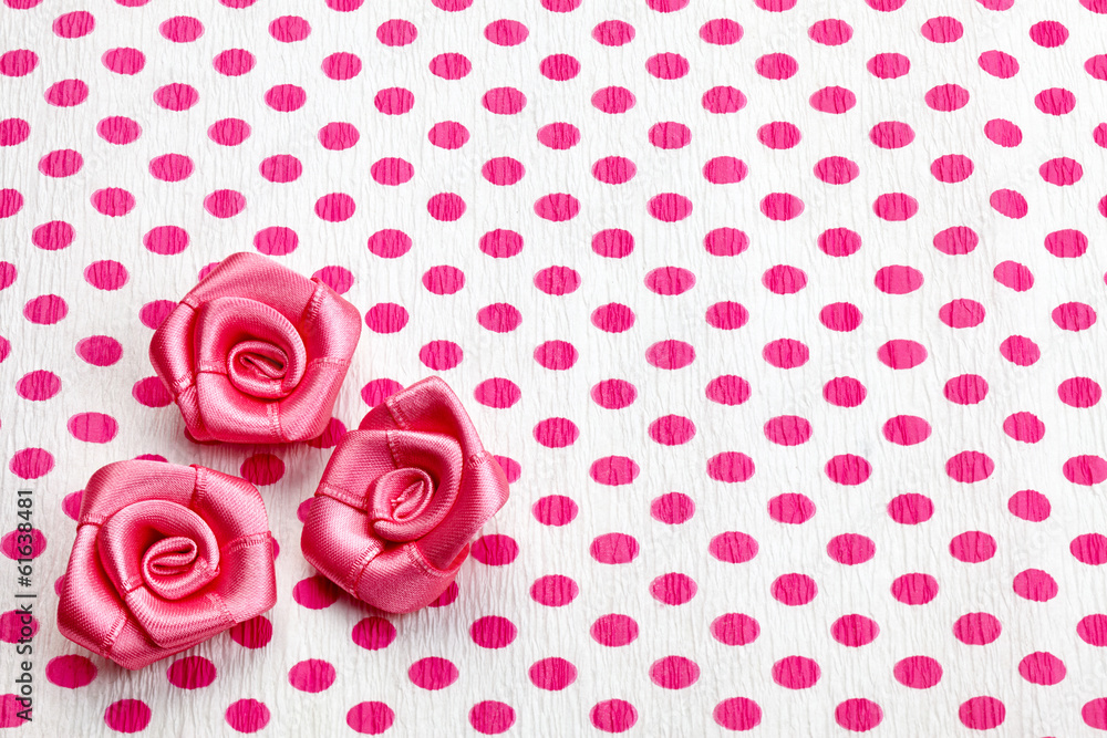 polka dot paper and pink decorative roses