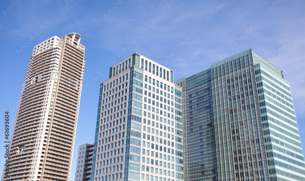 The high - rise buildings and blue sky