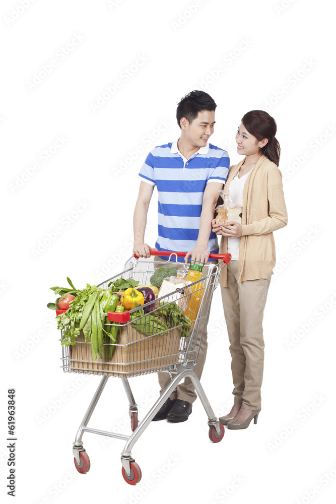 .Young Couple Grocery Shopping.