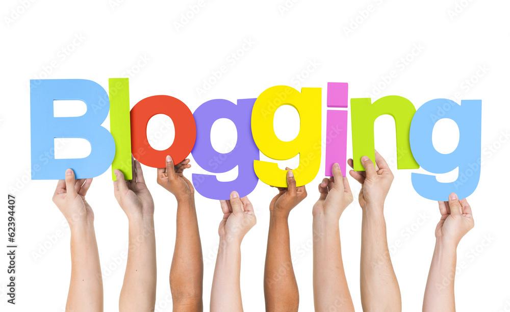 Multi Ethnic People Holding The Word Blogging