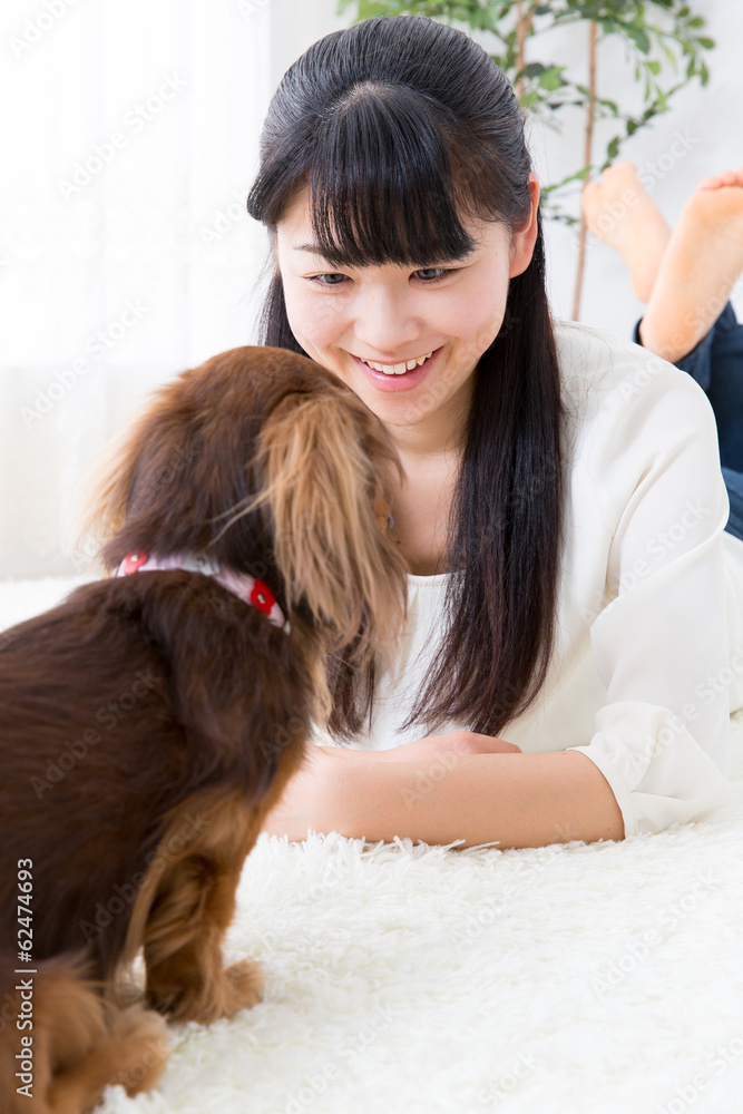 young asian woman and dog lifestyle image