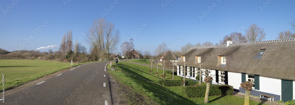 dike with houses