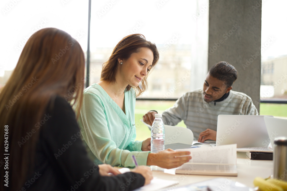 Young students studying in library