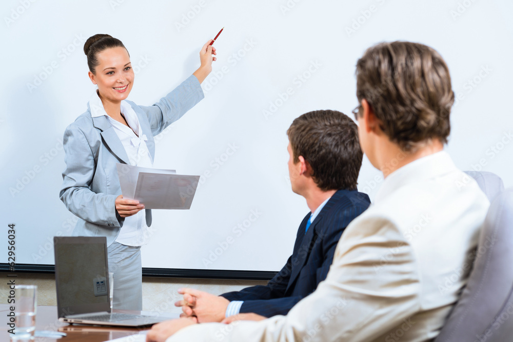 Business woman showing a presentation