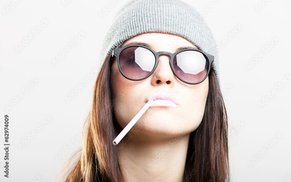 Stylish hipster teenage girl with cigarette