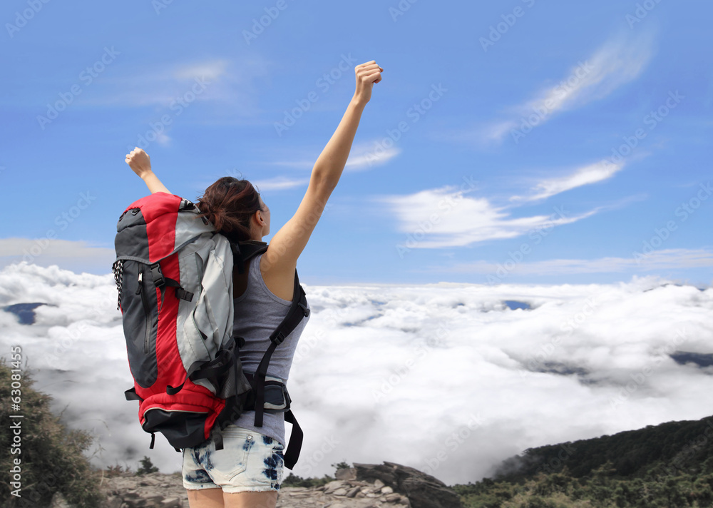 happy woman mountain hiker