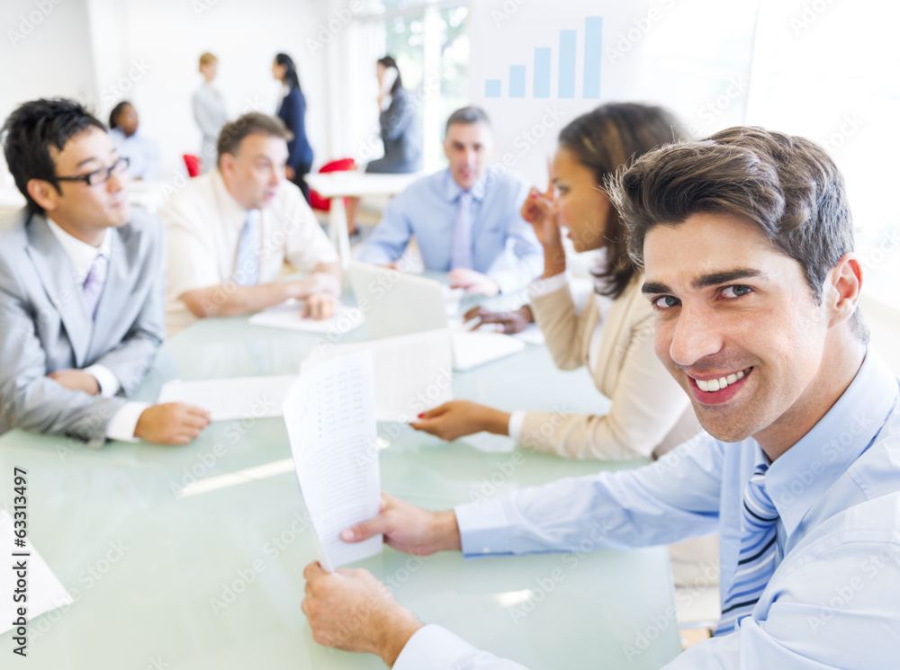 Cheerful Businessman in a Business Meeting